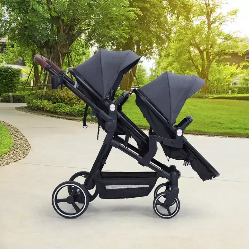 Foldable double stroller for newborns and toddlers with a reversible seat, five-point safety harness, adjustable backrest, and canopy storage basket